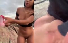 Morena fogosa mamando e dando prazer na praia com amigo